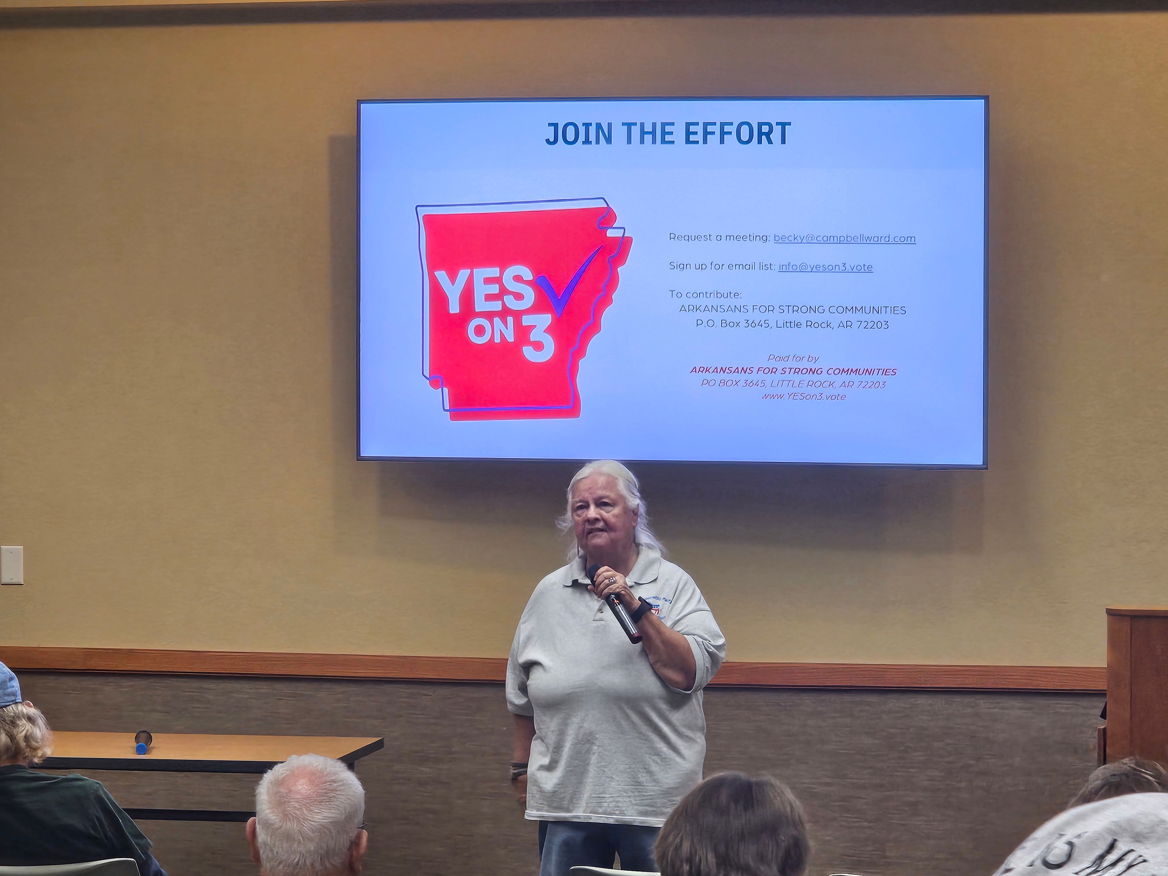 Micha Johnson speaking with voters